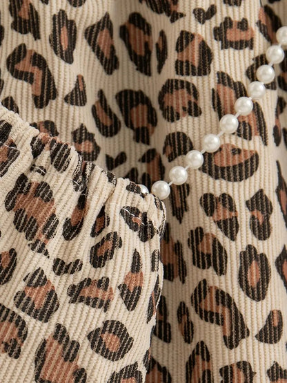 Vestido Animal Print con Mini Bolso
